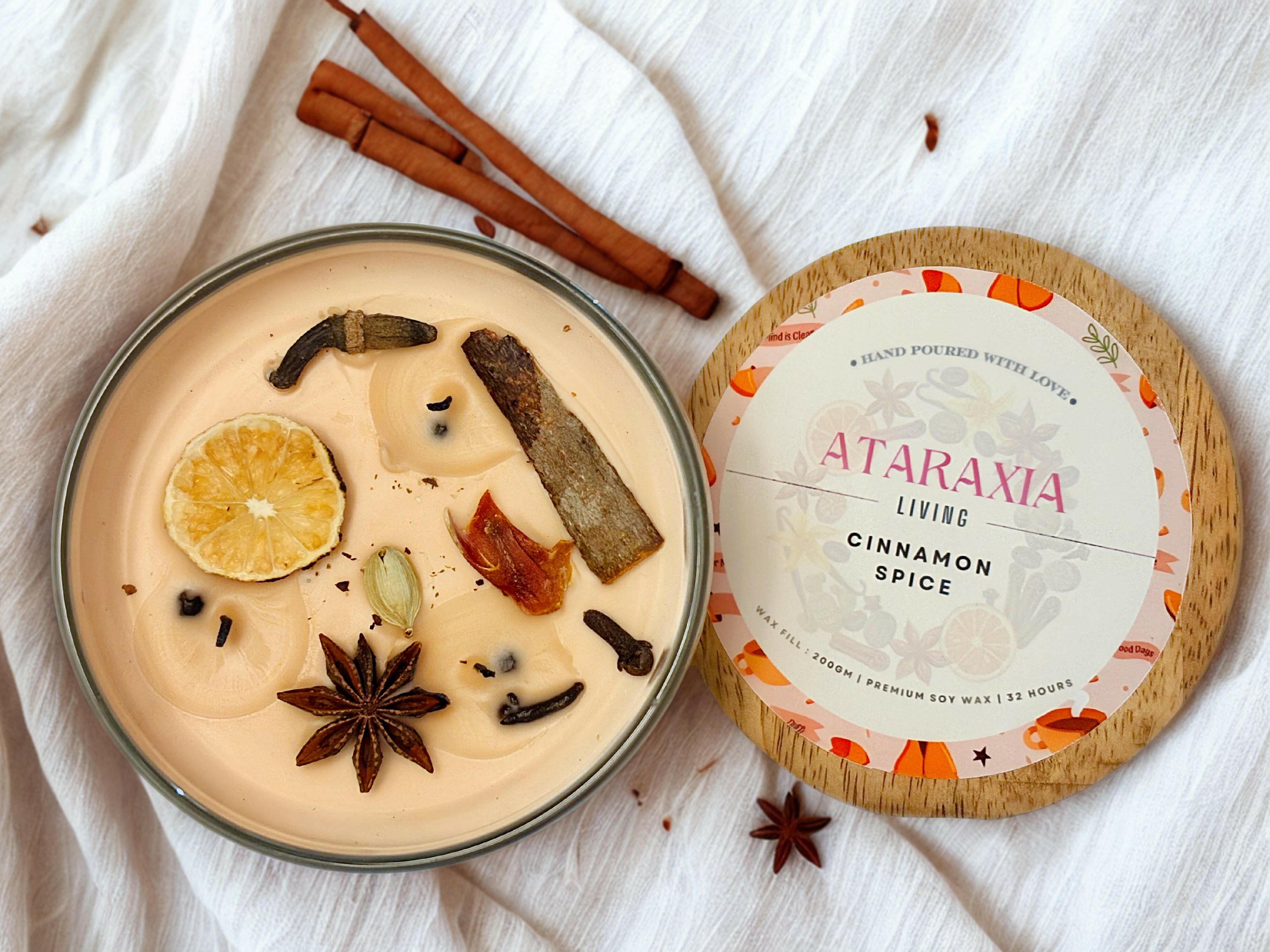 Hand-poured cinnamon candle with premium packaging