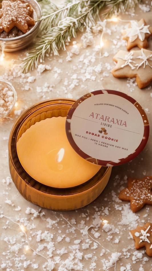 Sugar Cookie candle in frosted jar with festive cookie setup